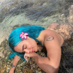 the busty Alexis Arias deepthroats until her cock is wet